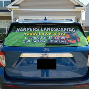 Custom perforated rear window vinyl decal for business advertising on vehicle back glass