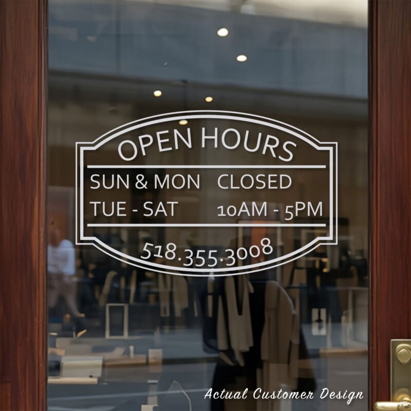 Custom open hours decal applied on wooden glass door, business storefront vinyl lettering, personalized store hours sticker by TheRetractableBanner.Shop