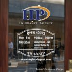 Custom open hours decal applied on wooden glass door, business storefront vinyl lettering, personalized store hours sticker by TheRetractableBanner.Shop