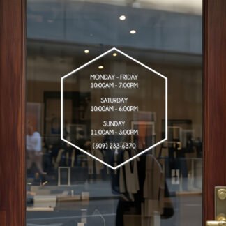 Custom open hours decal applied on wooden glass door, business storefront vinyl lettering, personalized store hours sticker by TheRetractableBanner.Shop