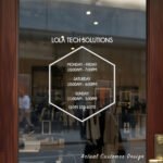 Custom open hours decal applied on wooden glass door, business storefront vinyl lettering, personalized store hours sticker by TheRetractableBanner.Shop