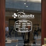 Custom open hours decal applied on wooden glass door, business storefront vinyl lettering, personalized store hours sticker by TheRetractableBanner.Shop