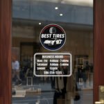 Custom open hours decal applied on wooden glass door, business storefront vinyl lettering, personalized store hours sticker by TheRetractableBanner.Shop