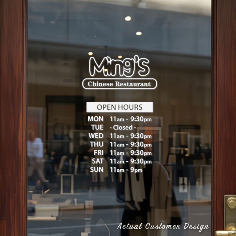 Custom open hours decal applied on wooden glass door, business storefront vinyl lettering, personalized store hours sticker by TheRetractableBanner.Shop