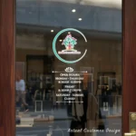 Custom open hours decal applied on wooden glass door, business storefront vinyl lettering, personalized store hours sticker by TheRetractableBanner.Shop