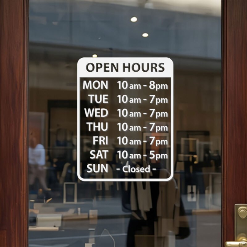 Custom open hours decal applied on wooden glass door, business storefront vinyl lettering, personalized store hours sticker by TheRetractableBanner.Shop