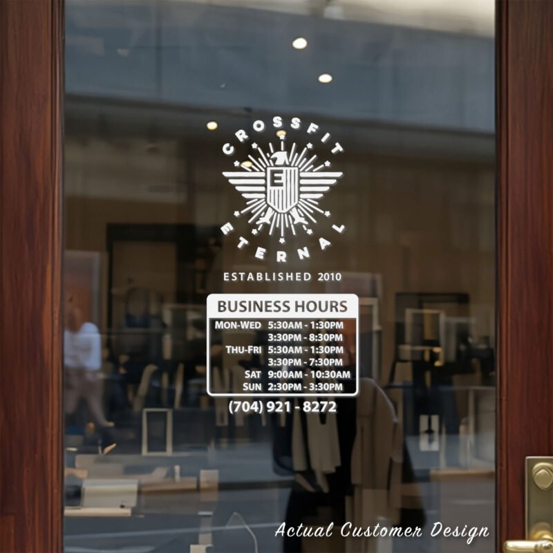 Custom open hours decal applied on wooden glass door, business storefront vinyl lettering, personalized store hours sticker by TheRetractableBanner.Shop